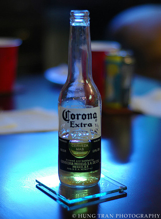 19) Corona bottle bathed in aquarium actinic blue light.